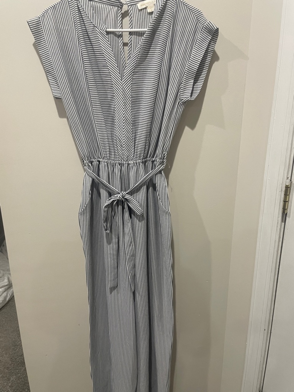 Sleeveless Black & White Striped Jumpsuit with Waist Tie